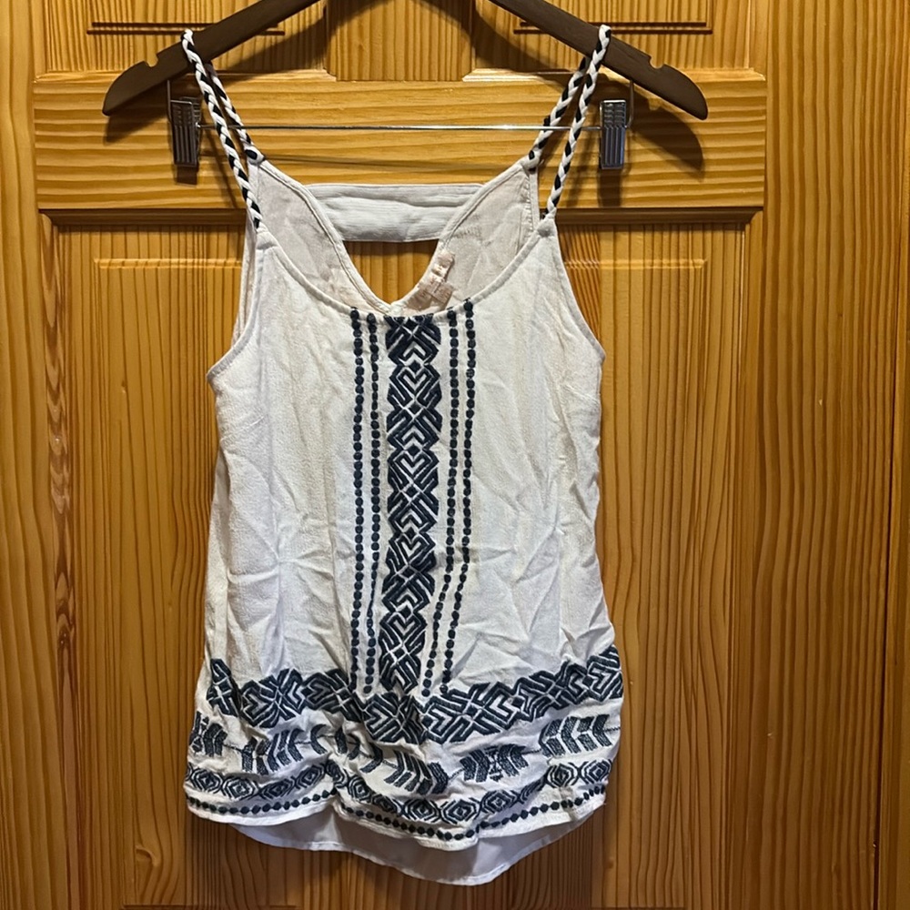 Skies are blue, medium, tribal pattern tank top.